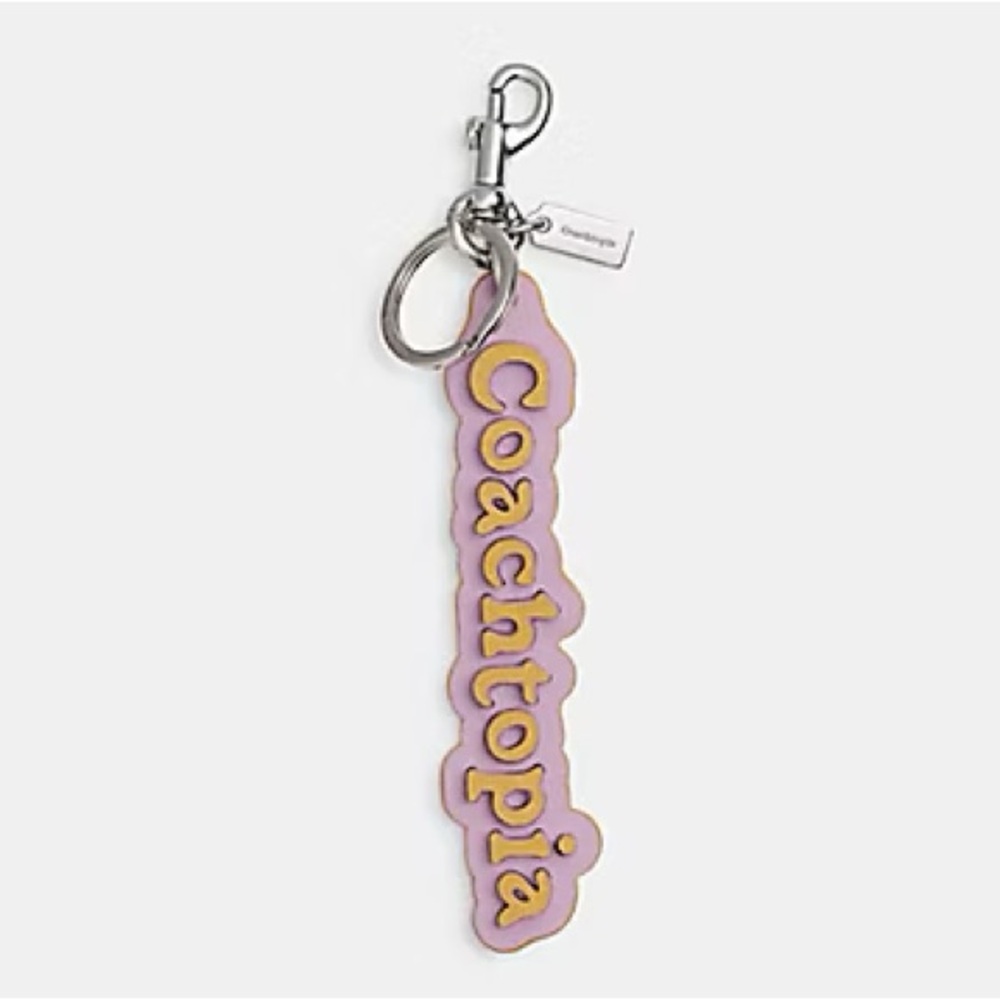 Coach Coachtopia Logo Bag Charm in Violet Orchid/Flax Coachtopia Leather NWT - Picture 16 of 16